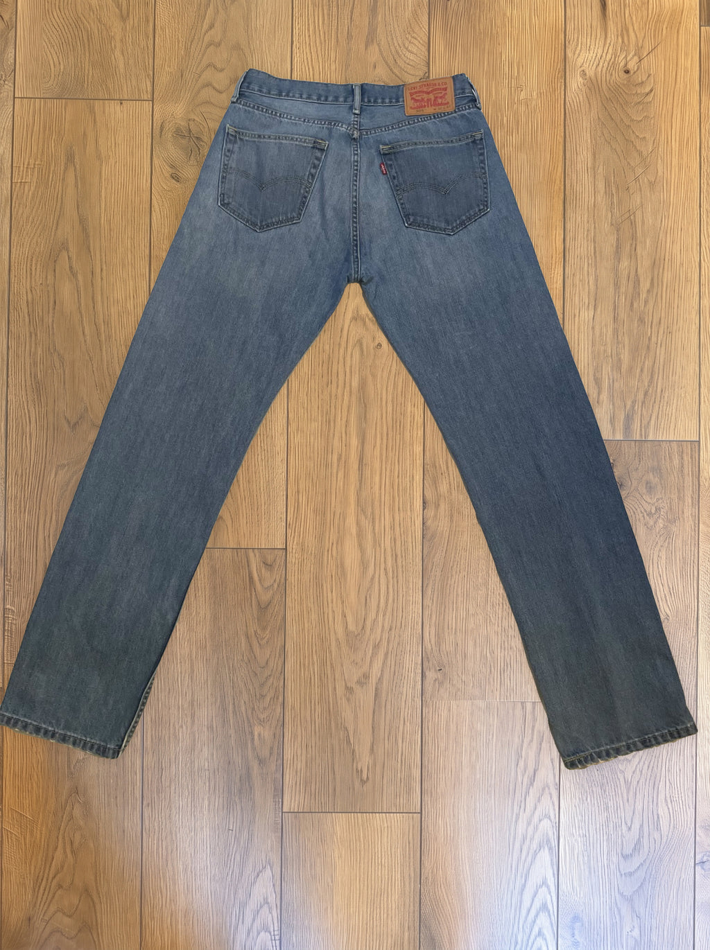 Vintage Levi's 505 jeans in faded mid wash — back
