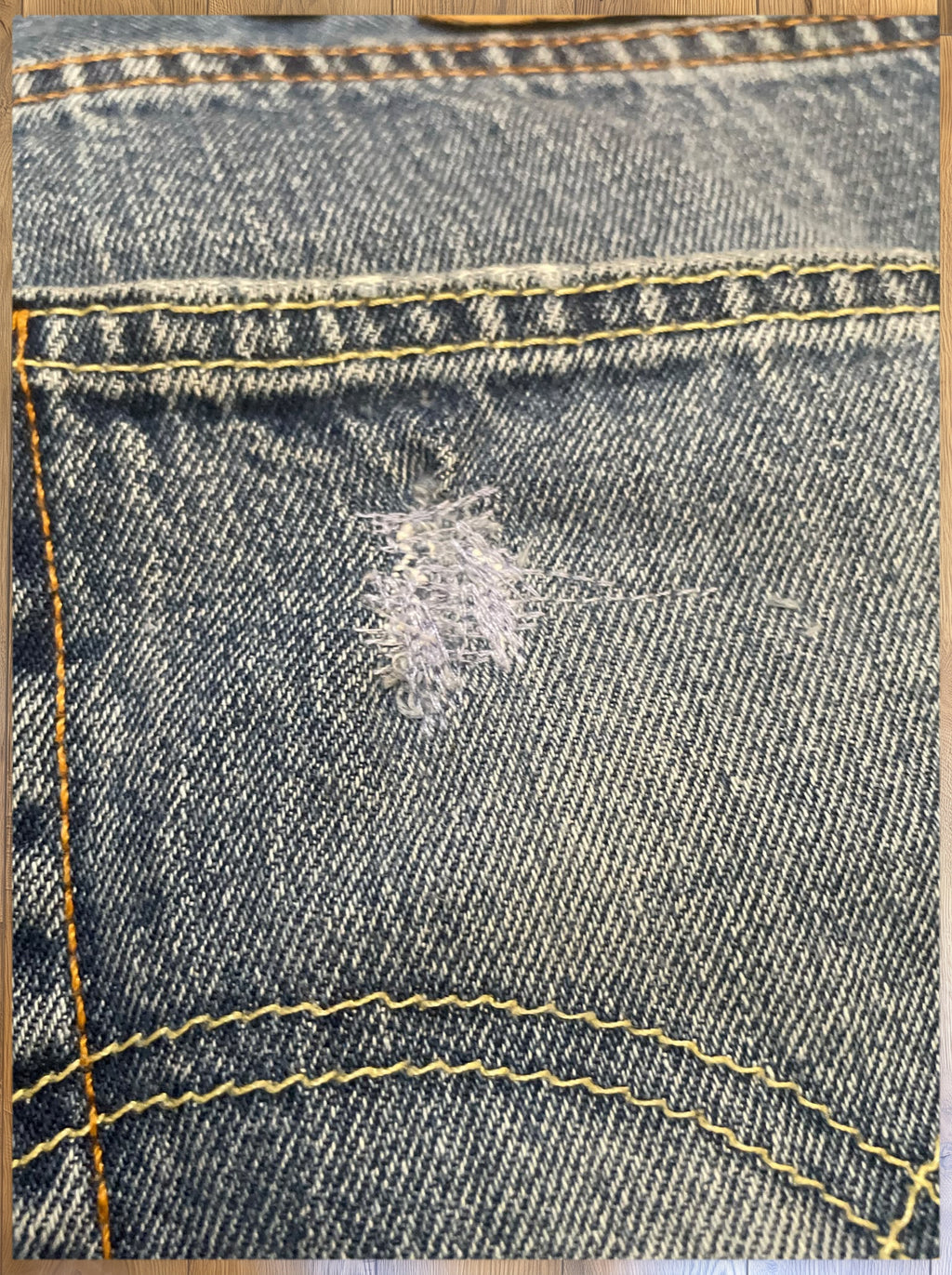 Vintage Levi's 505 jeans in light blue wash — detail