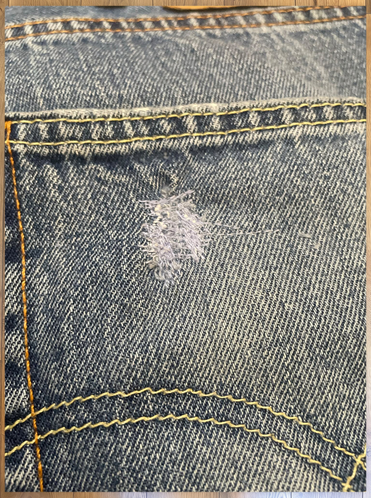 Vintage Levi's 505 jeans in light blue wash — detail