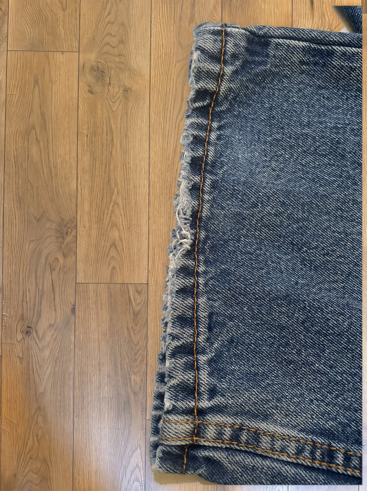 Vintage Levi's 505 jeans in light blue wash — detail