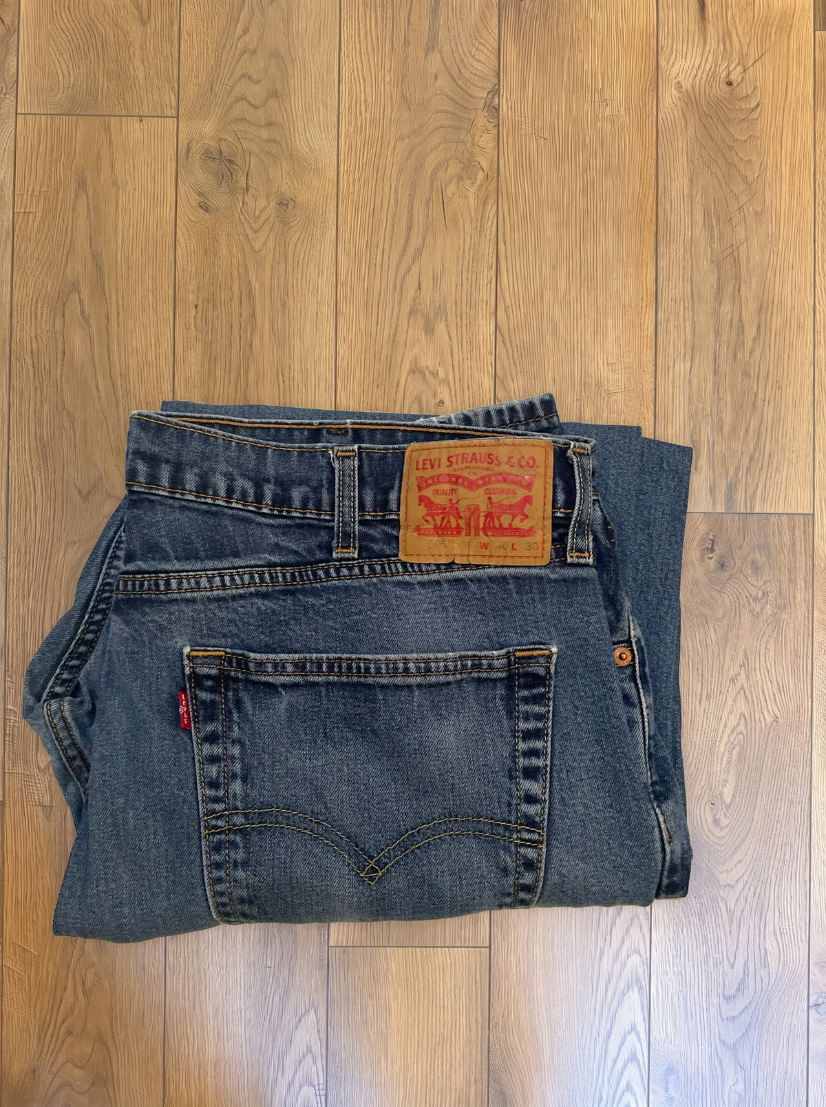 Vintage Levi's 505 jeans in mid blue wash — folded