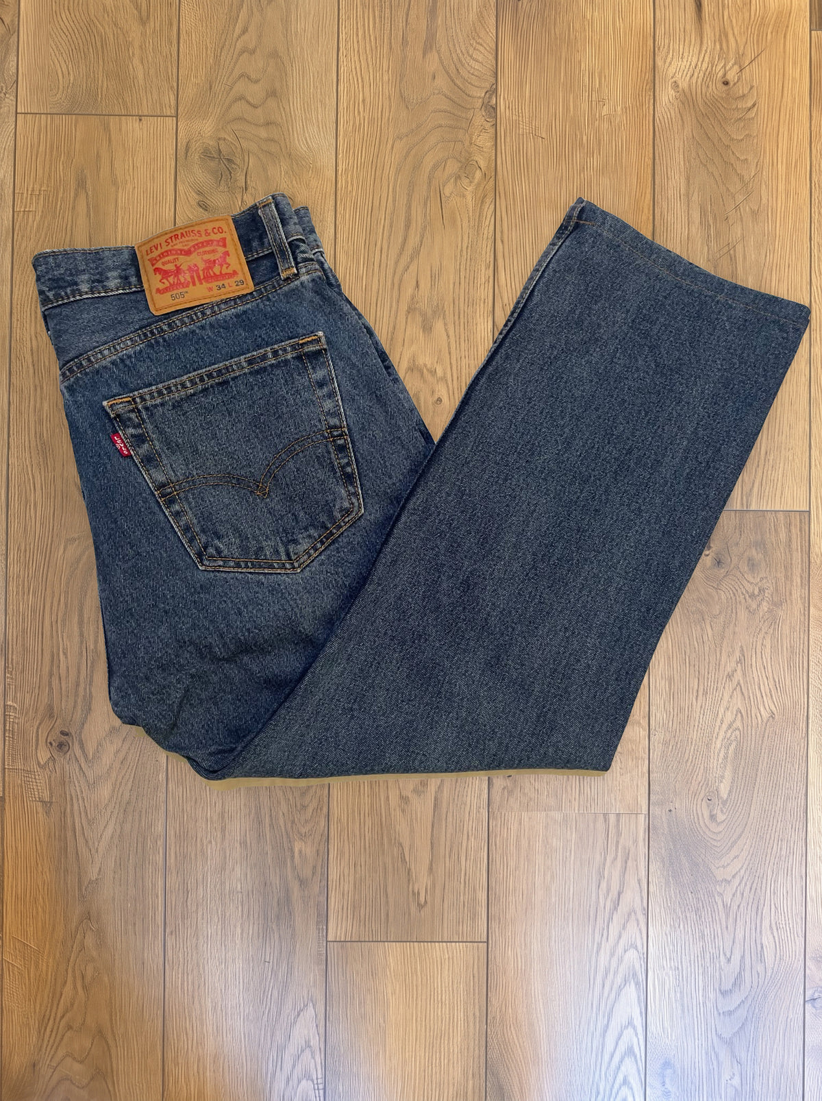 Vintage Levi's 550 jeans in medium wash — folded