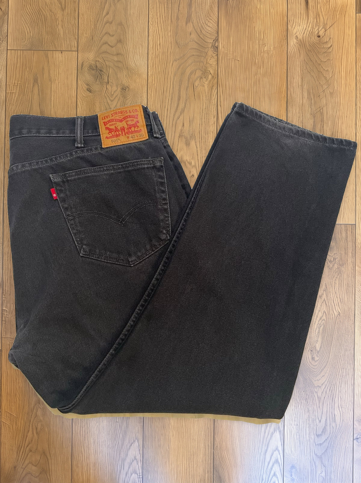 Vintage Levi's 505 jeans in faded black — folded