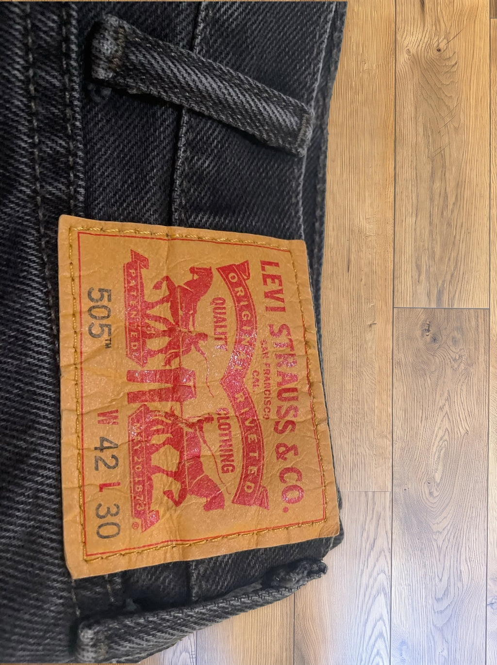 Vintage Levi's 505 jeans in faded black — detail