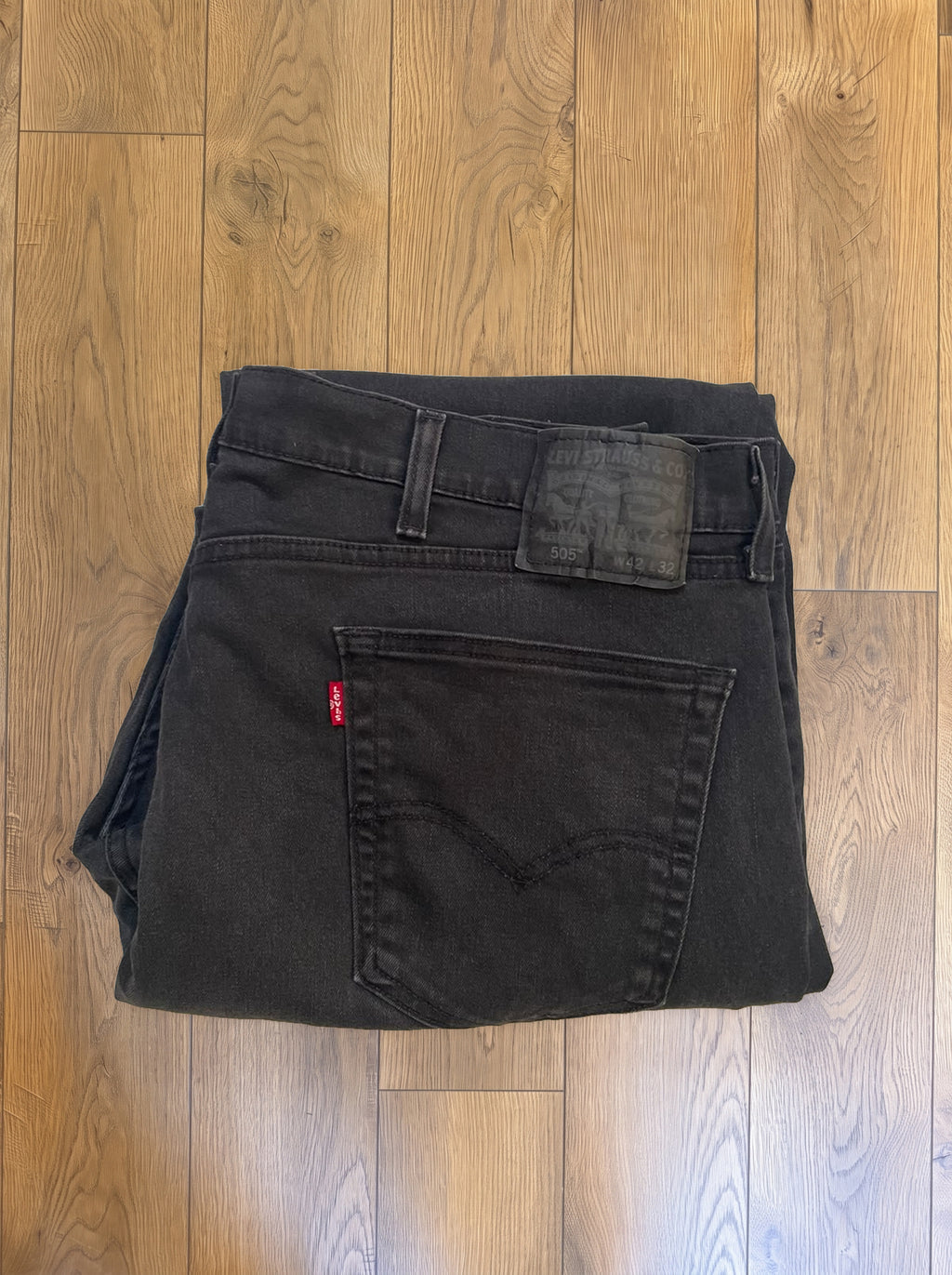 Vintage Levi's 505 jeans in washed black — folded