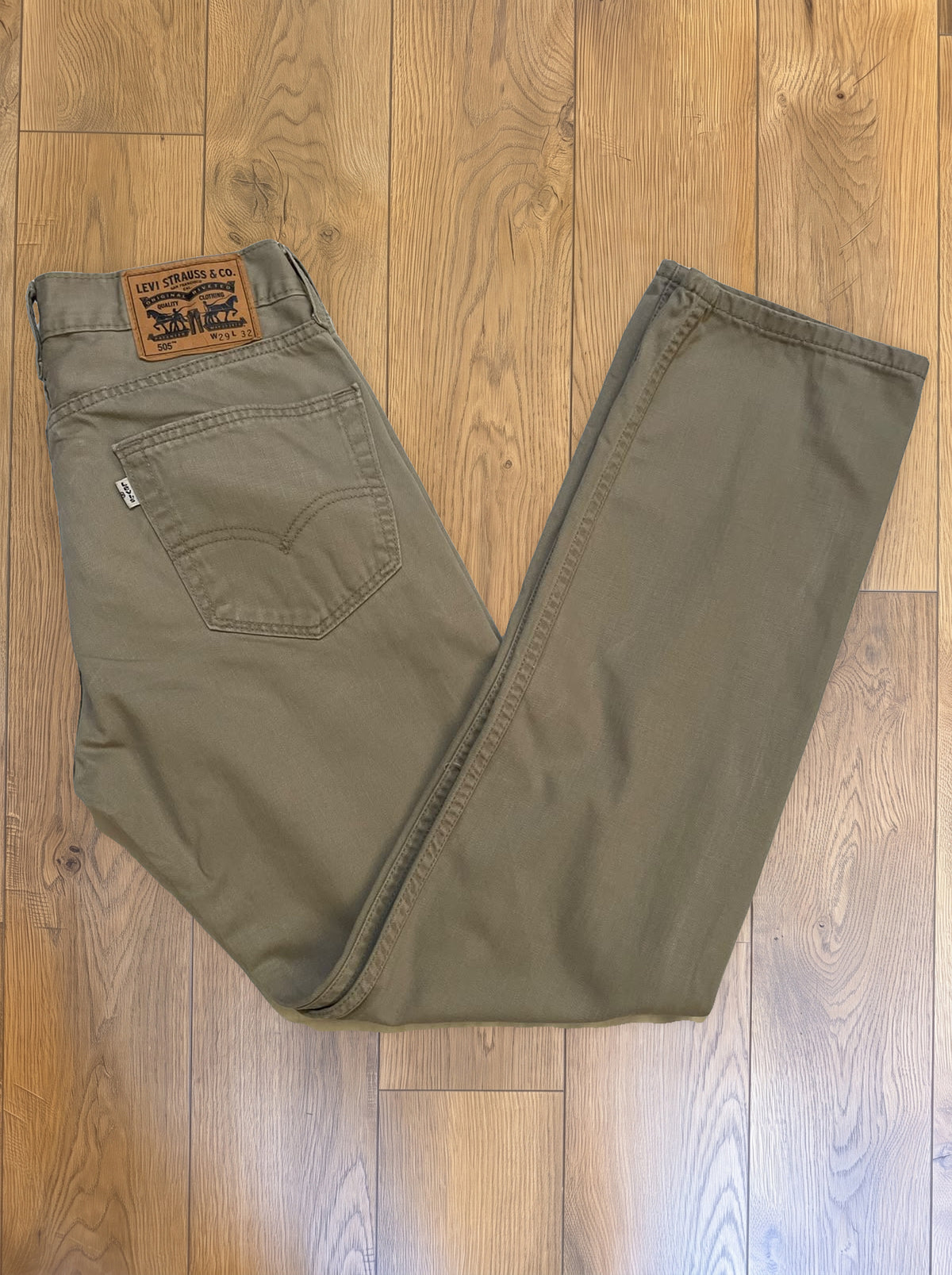 Vintage Levi's 505 jeans in stone khaki — folded