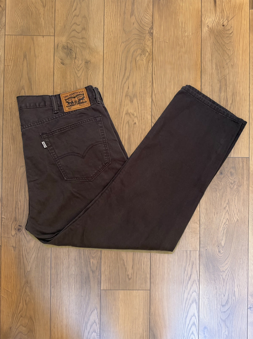 Vintage Levi's 505 jeans in dark brown — folded